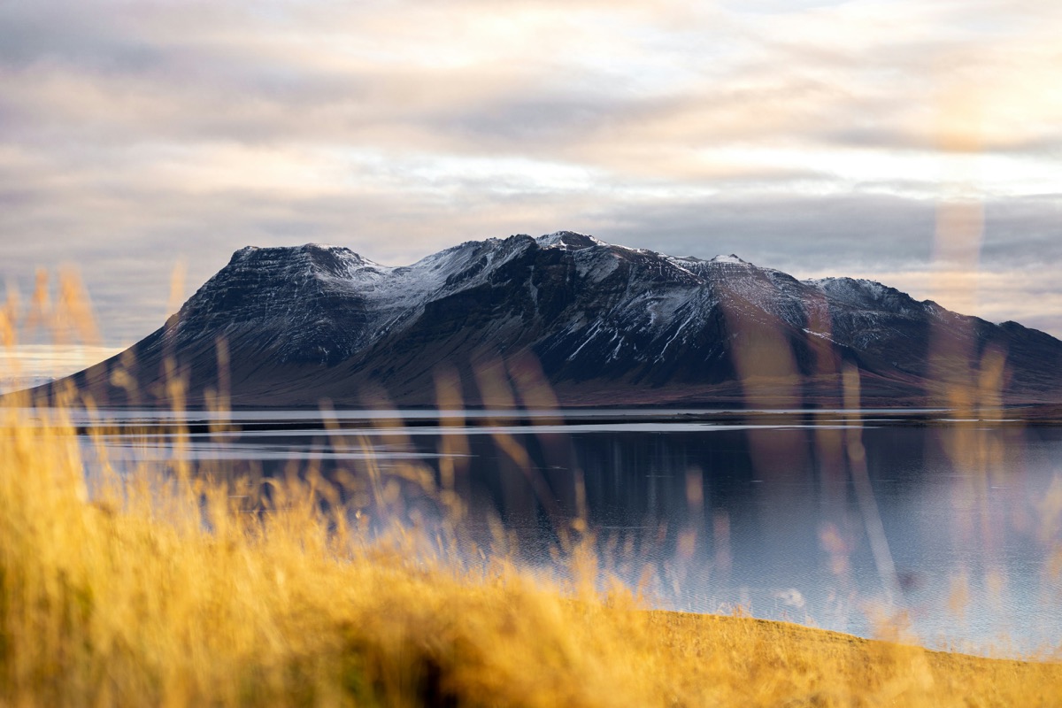 A view of a mountain and a body of water